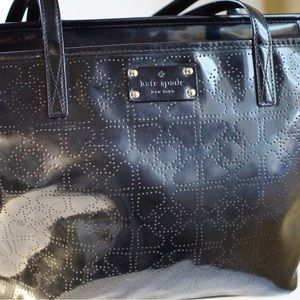 Upgrade your style with this stunning black Kate Spade purse in